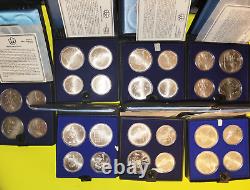 1976 Canadian Montreal Olympic Games 28 Silver Coin Set in Original Boxes Papers