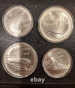 1976 Canadian Montreal Olympics Silver Coin Set Uncirc. 28 coin set with COA. 925