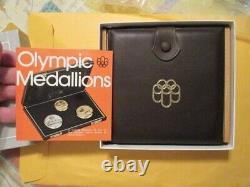 1976 Canadian Olympic Silver Coin Set #1 In the original wood/ leather box withCOA