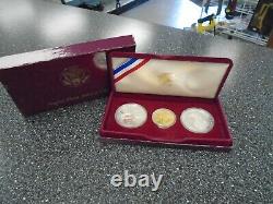 1983 / 1984 US Mint 3 Coin Olympic Proof Set ($10 Gold, $1 Silver, $1 Silver)