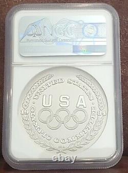 1984 NGC MS 69 #1275 UNITED STATES 1.5oz Silver OLYMPIC-ARCHERY Salvador Dali
