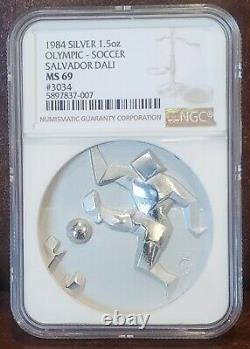 1984 NGC PF 69 UNITED STATES 1.5oz Silver OLYMPIC SOCCER By Salvador Dali