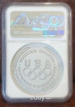 1984 NGC PF 69 UNITED STATES 1.5oz Silver OLYMPIC SOCCER By Salvador Dali