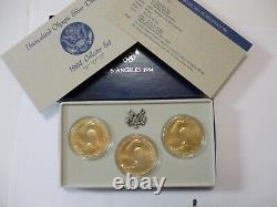 1984 US Olympic silver dollar set. Collector set P D S. Set of 3 coins. Toned