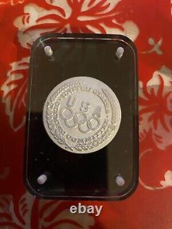 1984 commemorative silver dollar Los Angeles Olympics Coin Track and Field