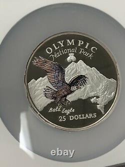 1996 Cooks Island Silver. 999 $25 Olympic National Park Colorized NGC PF 69