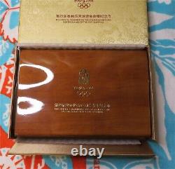 2008 Beijing Olympics 6 Coin Set. 66 oz. 999 Gold and 4 oz. 999 Silver Case
