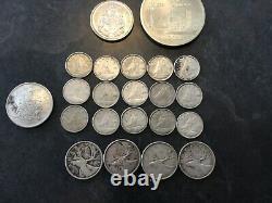Canadian silver coins $13.50 face value, circulated. Includes large Olympic coin