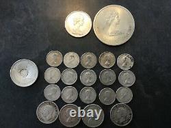 Canadian silver coins $13.50 face value, circulated. Includes large Olympic coin