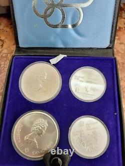 Silver Coins in Cases / Collectibles from Olympic Games Montreal 1974
