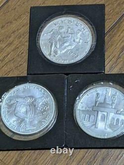 Two Los Angeles Olympics Memorial and World Cup American $ 1 SILVER COINS unused